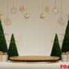 christmas background with cylindrical podium for promotions. round stage for presentation sale product. glass balls hanging. 3d render