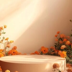 a decorative display featuring vibrant orange flowers surrounding a circular pedestal