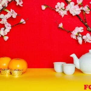 tea set, oranges, ingots and red envelope packet or ang bao(word