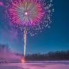 a vibrant fireworks display over a snowy landscape, creating con