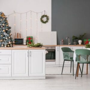 interior,of,kitchen,with,christmas,trees,,counters,and,dining,table