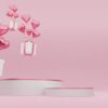 empty white cylinder podium with pink border, gift boxes, hearts