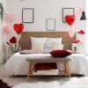 interior,of,bedroom,with,gifts,and,balloons,for,valentine's,day