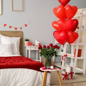 interior,of,bedroom,decorated,for,valentine's,day,with,roses,,hearts