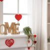 mantelpiece,with,decorative,word,home,and,hearts,for,valentine's,day