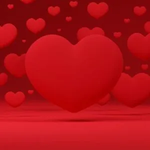 3d hearts floating on a red background.3d illustration.