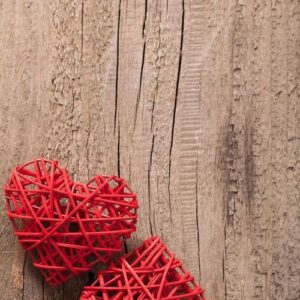 red hearts over wooden background for valentines day